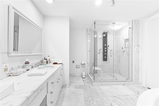 19667 Turnberry Way Unit 3F, Aventura, FL 33180 - full bathroom with marble look tiles, a marble finish shower, vanity, and recessed lighting