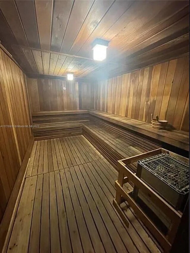 19667 Turnberry Way Unit 3F, Aventura, FL 33180 - relaxing sauna featuring wooden ceiling, wooden walls, and hardwood / wood-style flooring