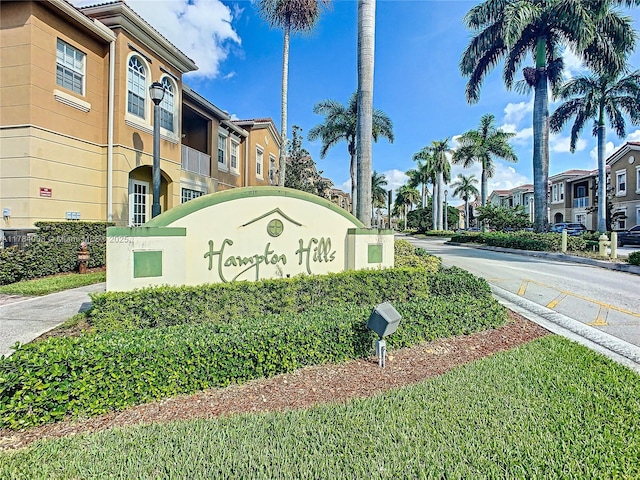community / neighborhood sign featuring a residential view