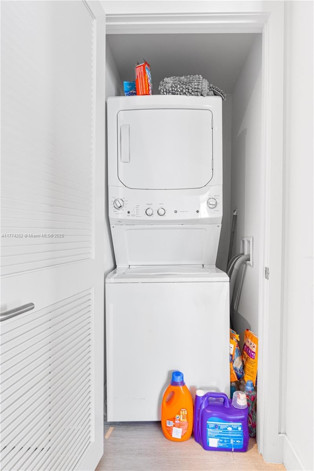 4010 S Ocean Dr Unit T3609, Hollywood, FL 33019 - clothes washing area featuring stacked washer / dryer
