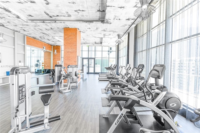 4010 S Ocean Dr Unit T3609, Hollywood, FL 33019 - workout area with wood finished floors and a wall of windows