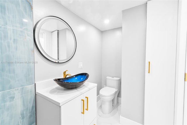 2851 NE 183rd St Unit 1504E, Aventura, FL 33160 - bathroom with vanity, toilet, and marble finish floors