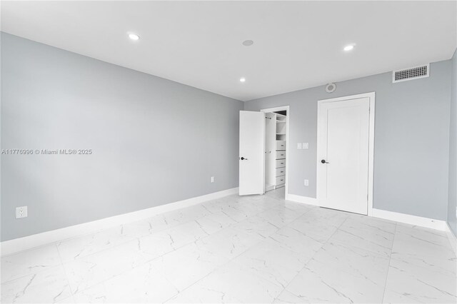 2851 NE 183rd St Unit 1504E, Aventura, FL 33160 - spare room with light marble finish flooring, baseboards, and recessed lighting