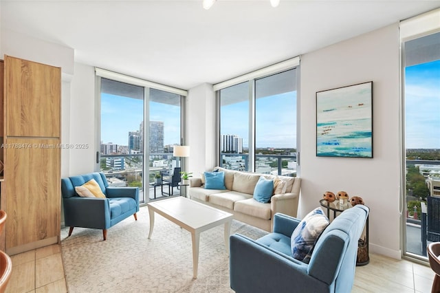 tiled living area featuring floor to ceiling windows and a city view