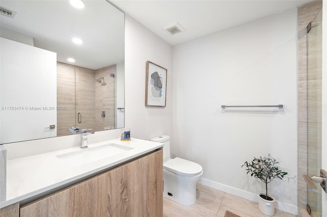bathroom with visible vents, recessed lighting, toilet, a stall shower, and baseboards