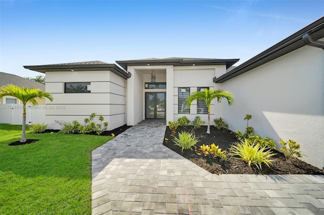 2138 SW 3rd Ave, Cape Coral, FL 33991 - property entrance with stucco siding