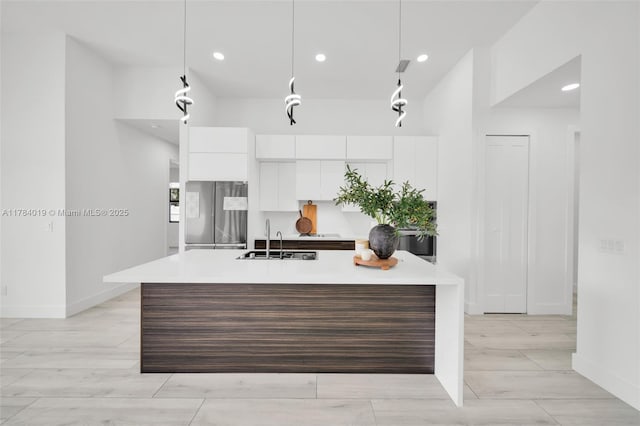2138 SW 3rd Ave, Cape Coral, FL 33991 - kitchen featuring freestanding refrigerator, modern cabinets, white cabinets, light countertops, and recessed lighting