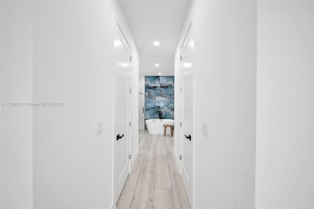2138 SW 3rd Ave, Cape Coral, FL 33991 - corridor with recessed lighting and light wood-style flooring