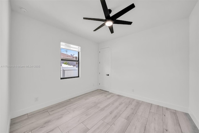 2138 SW 3rd Ave, Cape Coral, FL 33991 - empty room with ceiling fan and wood finished floors