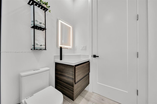 2138 SW 3rd Ave, Cape Coral, FL 33991 - bathroom featuring vanity and toilet
