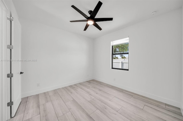 2138 SW 3rd Ave, Cape Coral, FL 33991 - empty room featuring light wood-style floors and a ceiling fan