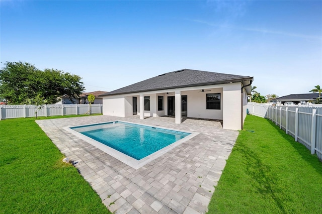 2138 SW 3rd Ave, Cape Coral, FL 33991 - view of swimming pool featuring ceiling fan, a patio, and a fenced backyard