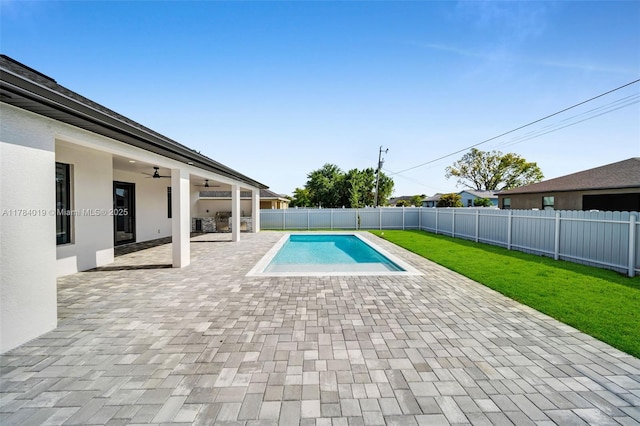 2138 SW 3rd Ave, Cape Coral, FL 33991 - view of pool with ceiling fan, a fenced backyard, and a patio area