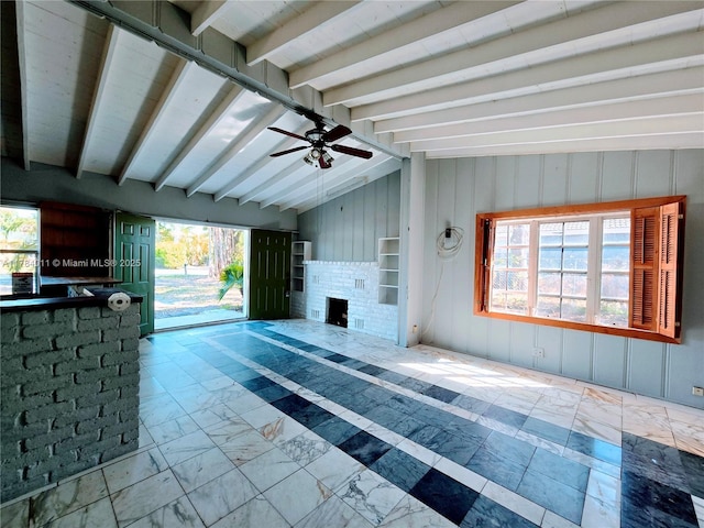 6208 SW 26th St, Miramar, FL 33023 - unfurnished living room with plenty of natural light, a ceiling fan, and a brick fireplace