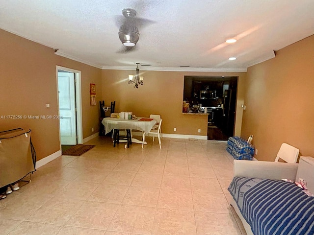 470 N Laurel Dr Unit 6A, Margate, FL 33063 - living room with crown molding, light tile patterned floors, and baseboards