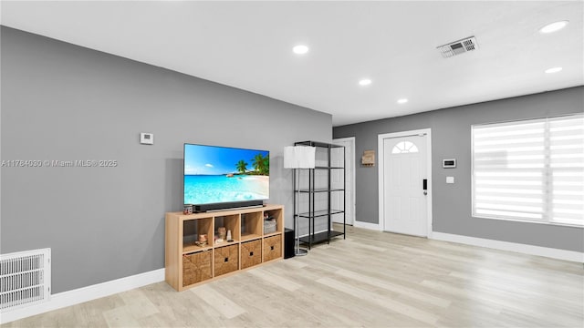 6582 SW 20th St, North Lauderdale, FL 33068 - unfurnished living room with wood finished floors and recessed lighting
