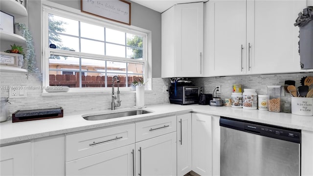 6582 SW 20th St, North Lauderdale, FL 33068 - kitchen featuring stainless steel dishwasher, white cabinetry, tasteful backsplash, and open shelves