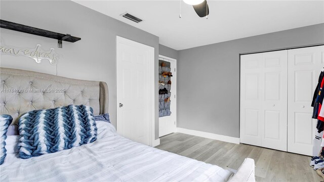 6582 SW 20th St, North Lauderdale, FL 33068 - bedroom featuring wood finished floors, a closet, and a ceiling fan