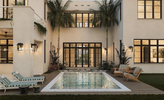 1259 NE 97th St, Miami Shores, FL 33138 - rear view of house featuring stucco siding, an outdoor pool, and a balcony