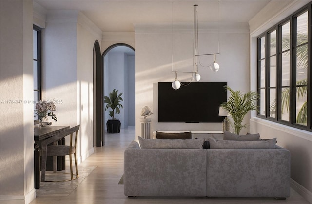 1259 NE 97th St, Miami Shores, FL 33138 - living room featuring arched walkways and wood finished floors