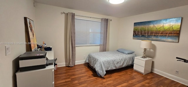 431 SE 3rd St Unit 205, Dania Beach, FL 33004 - bedroom featuring wood finished floors and baseboards