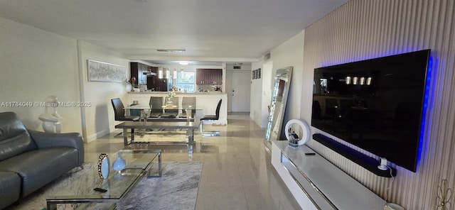 431 SE 3rd St Unit 205, Dania Beach, FL 33004 - living area featuring baseboards