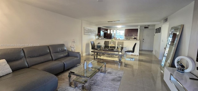 431 SE 3rd St Unit 205, Dania Beach, FL 33004 - living room featuring visible vents, baseboards, and tile patterned flooring