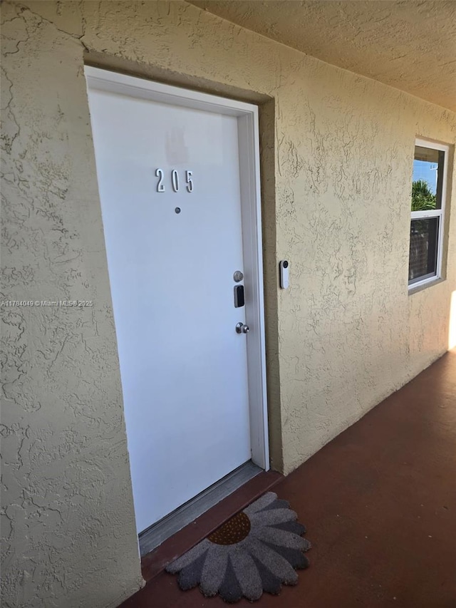 431 SE 3rd St Unit 205, Dania Beach, FL 33004 - entrance to property featuring stucco siding