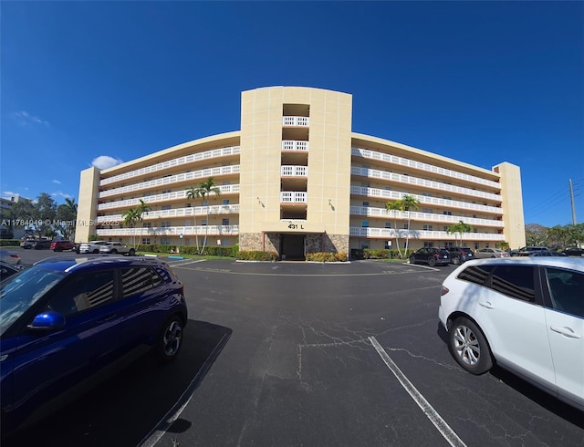 431 SE 3rd St Unit 205, Dania Beach, FL 33004 - view of building exterior with uncovered parking