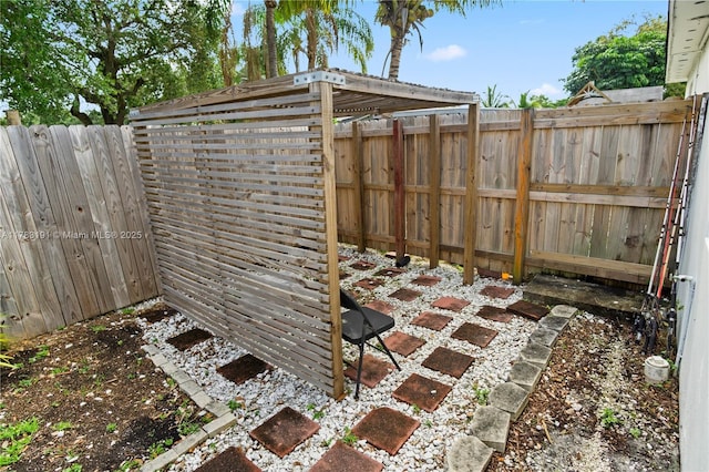 exterior space with a fenced backyard