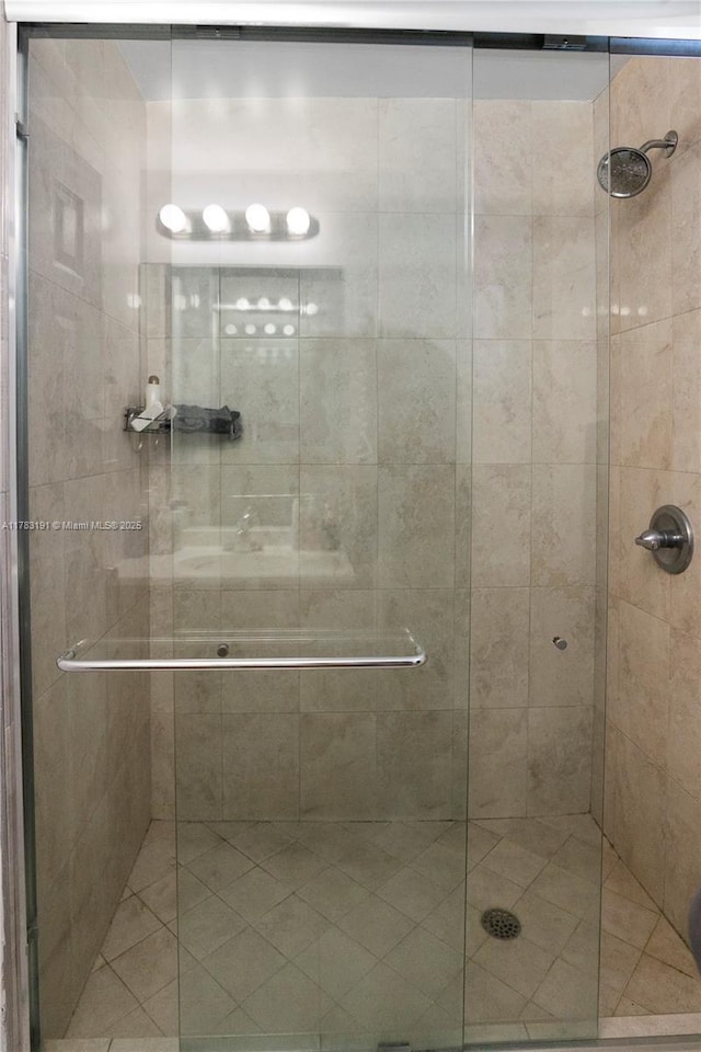bathroom with a stall shower