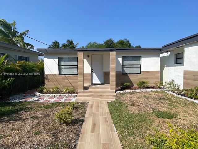 view of front of home with stucco siding
