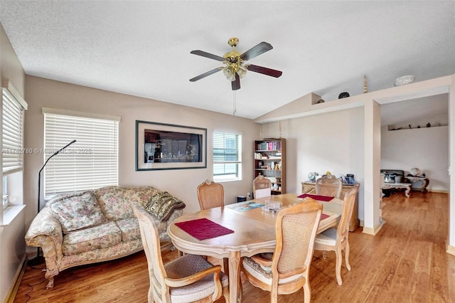 7324 NW 1st Pl, Plantation, FL 33317 - dining space with light wood-style floors, baseboards, a ceiling fan, and vaulted ceiling