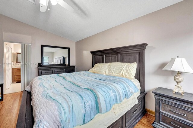 7324 NW 1st Pl, Plantation, FL 33317 - bedroom featuring ensuite bathroom, ceiling fan, light wood finished floors, and vaulted ceiling