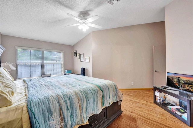 7324 NW 1st Pl, Plantation, FL 33317 - bedroom with visible vents, baseboards, ceiling fan, light wood-type flooring, and a textured ceiling