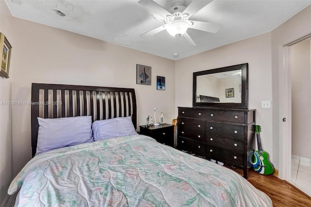 7324 NW 1st Pl, Plantation, FL 33317 - bedroom featuring ceiling fan, wood finished floors, and baseboards