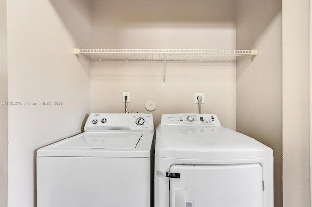 7324 NW 1st Pl, Plantation, FL 33317 - clothes washing area featuring washing machine and dryer and laundry area