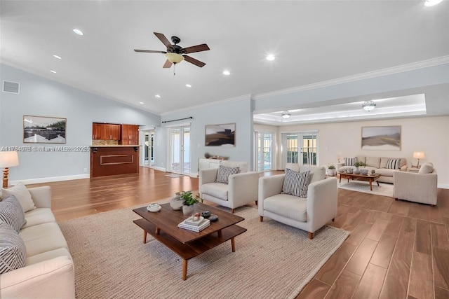 4991 NW 72nd Ter, Lauderhill, FL 33319 - living room with crown molding, ceiling fan, recessed lighting, baseboards, and wood finished floors