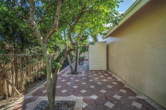4991 NW 72nd Ter, Lauderhill, FL 33319 - view of patio featuring a fenced backyard