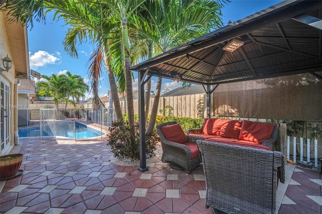 4991 NW 72nd Ter, Lauderhill, FL 33319 - view of pool with a patio, a gazebo, outdoor lounge area, and a fenced backyard