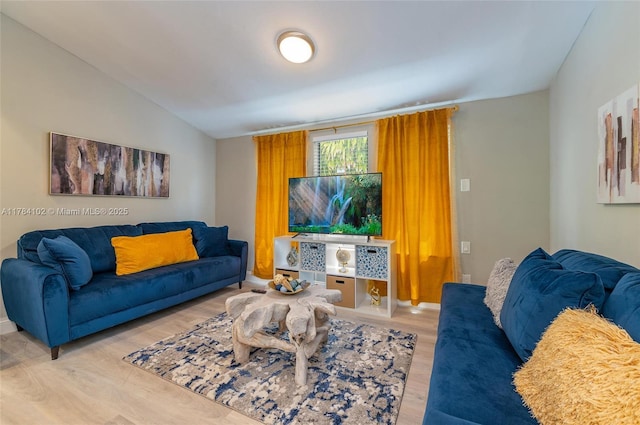 3313 SE 3rd St, Pompano Beach, FL 33062 - living area featuring light wood-style flooring and lofted ceiling