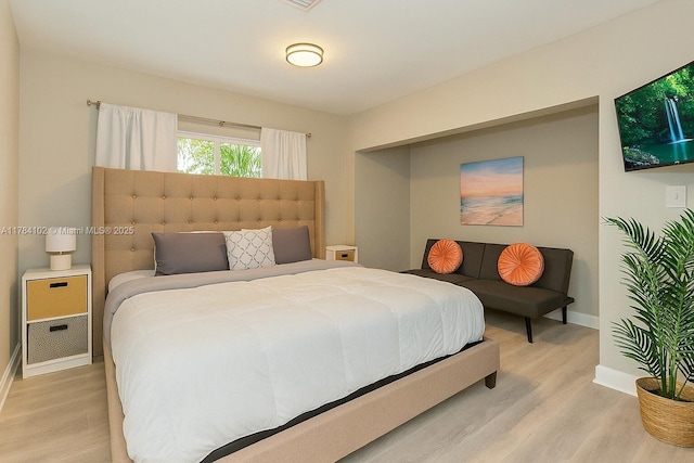 3313 SE 3rd St, Pompano Beach, FL 33062 - bedroom with light wood-style flooring and baseboards