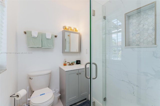 3313 SE 3rd St, Pompano Beach, FL 33062 - bathroom featuring vanity, a marble finish shower, and toilet