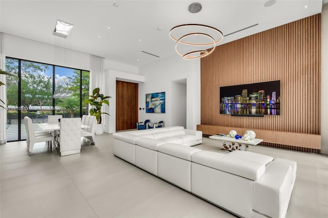 living area featuring a chandelier