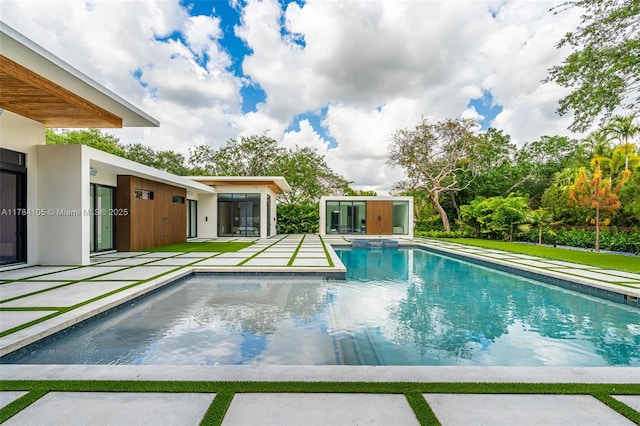 outdoor pool featuring a patio