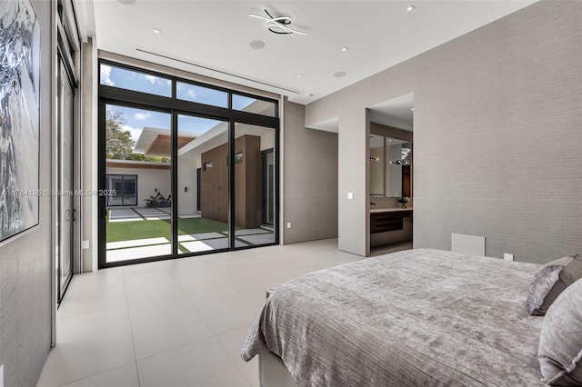 bedroom with access to exterior, tile patterned floors, and ensuite bathroom
