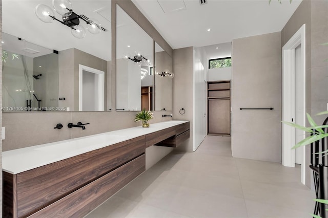 bathroom featuring double vanity and a shower