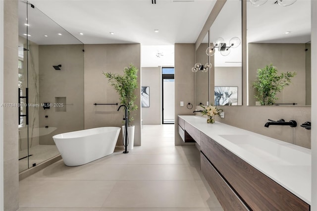 full bathroom featuring an enclosed shower, a freestanding bath, and double vanity