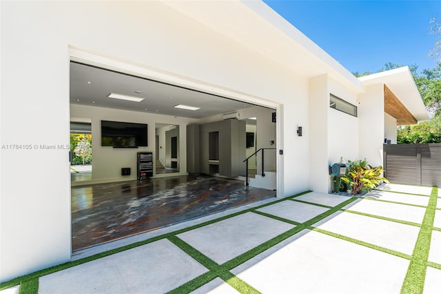 back of property featuring stucco siding and a patio area