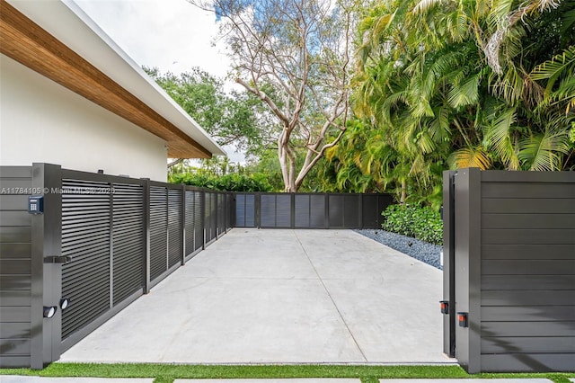 view of patio featuring fence